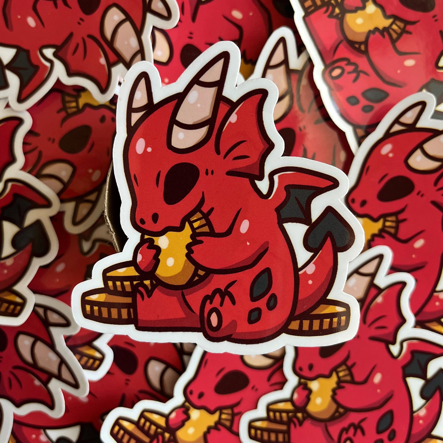 The sticker is represented with a collection of other stickers like it in the background.